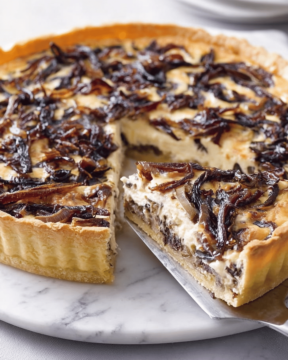 The image shows a sliced tart with a thick, golden-brown crust that looks crisp and flaky. The tart filling has three clear layers: the bottom layer is a light, creamy mix, the middle layer contains soft, beige-colored pieces, and the top layer is covered with cooked dark brown and purple strips, likely caramelized onions or mushrooms, that look slightly glossy and tender. A white marble textured surface serves as the background, and a woman's hand is partly visible holding the silver serving pie knife under a slice placed on a round white dish. photo taken with an iphone --ar 4:5 --v 7